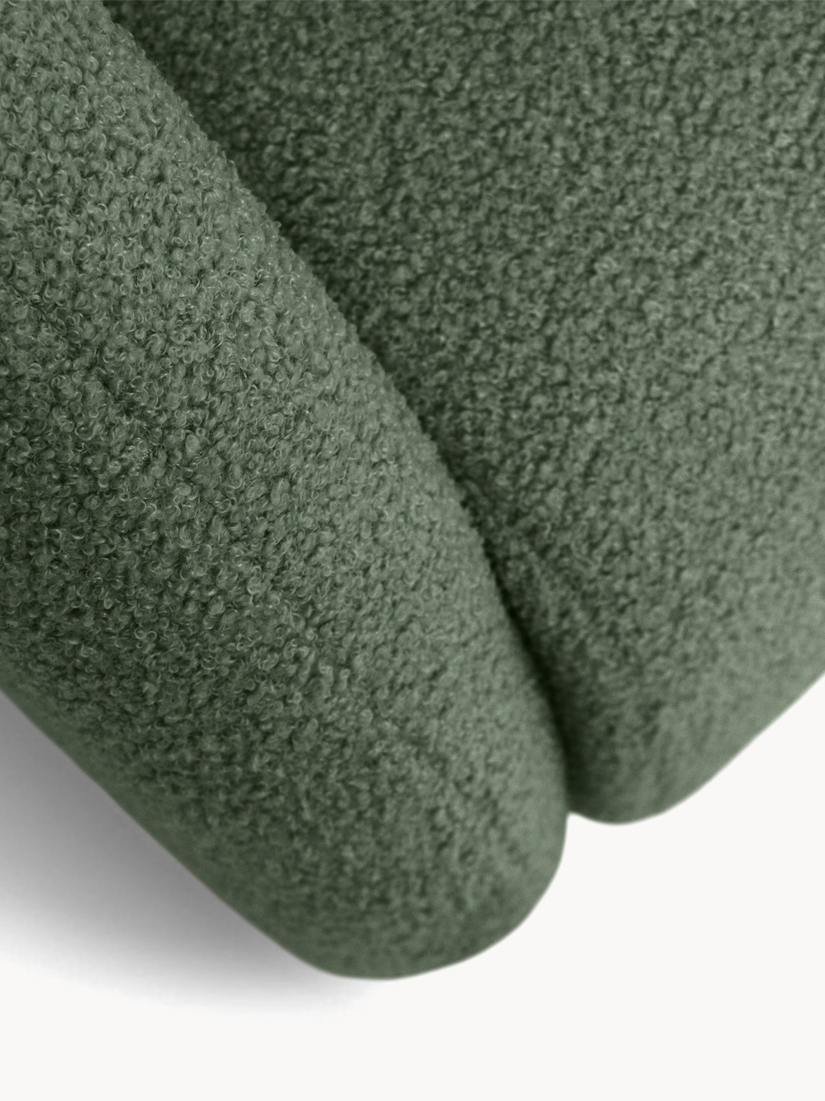 Zielona sofa rozkładana Nubi 120 cm z tkaniny boucle, detal tekstury