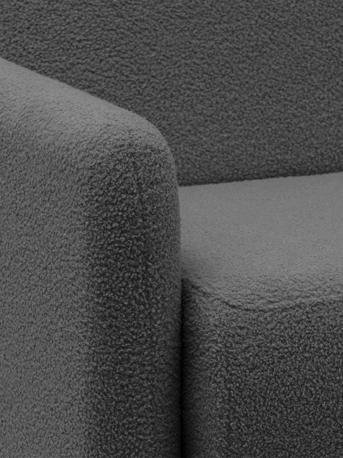 Rozkladacia pohovka Nido 120 cm v šedej boucle, detail rohu a sedadla